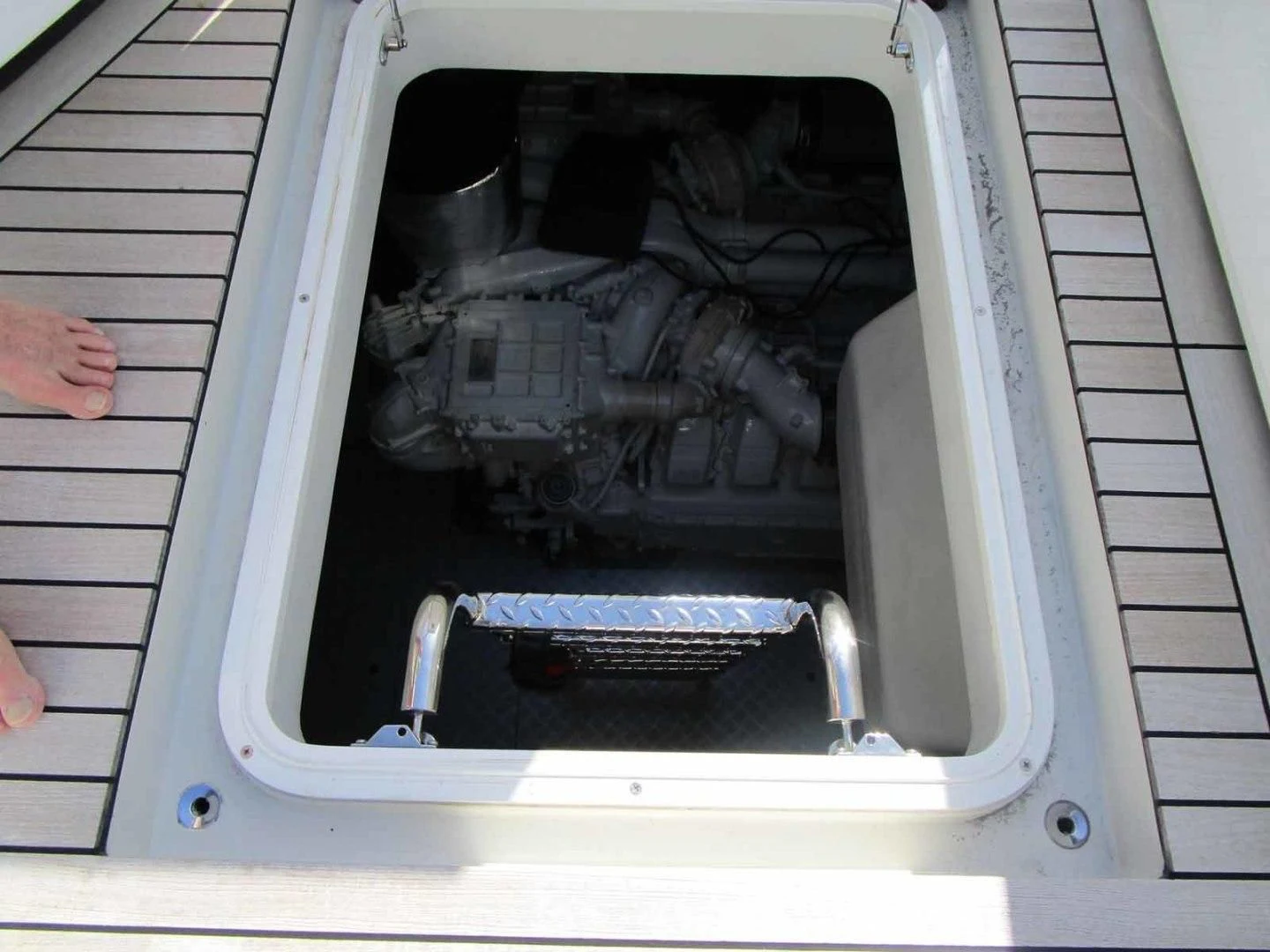 a car with its door open aboard REGENCY Yacht for Sale