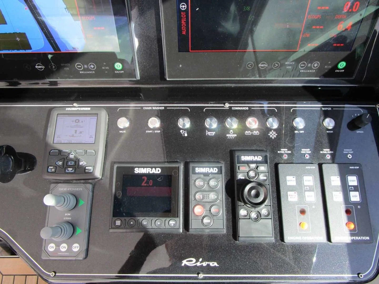 a close-up of a car stereo aboard REGENCY Yacht for Sale