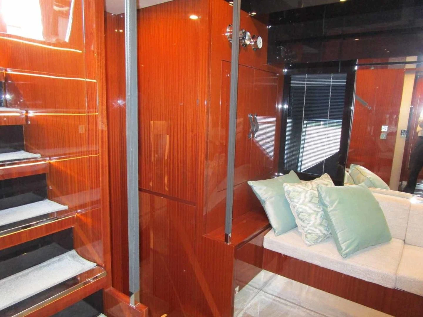 a room with a bed and a closet aboard REGENCY Yacht for Sale