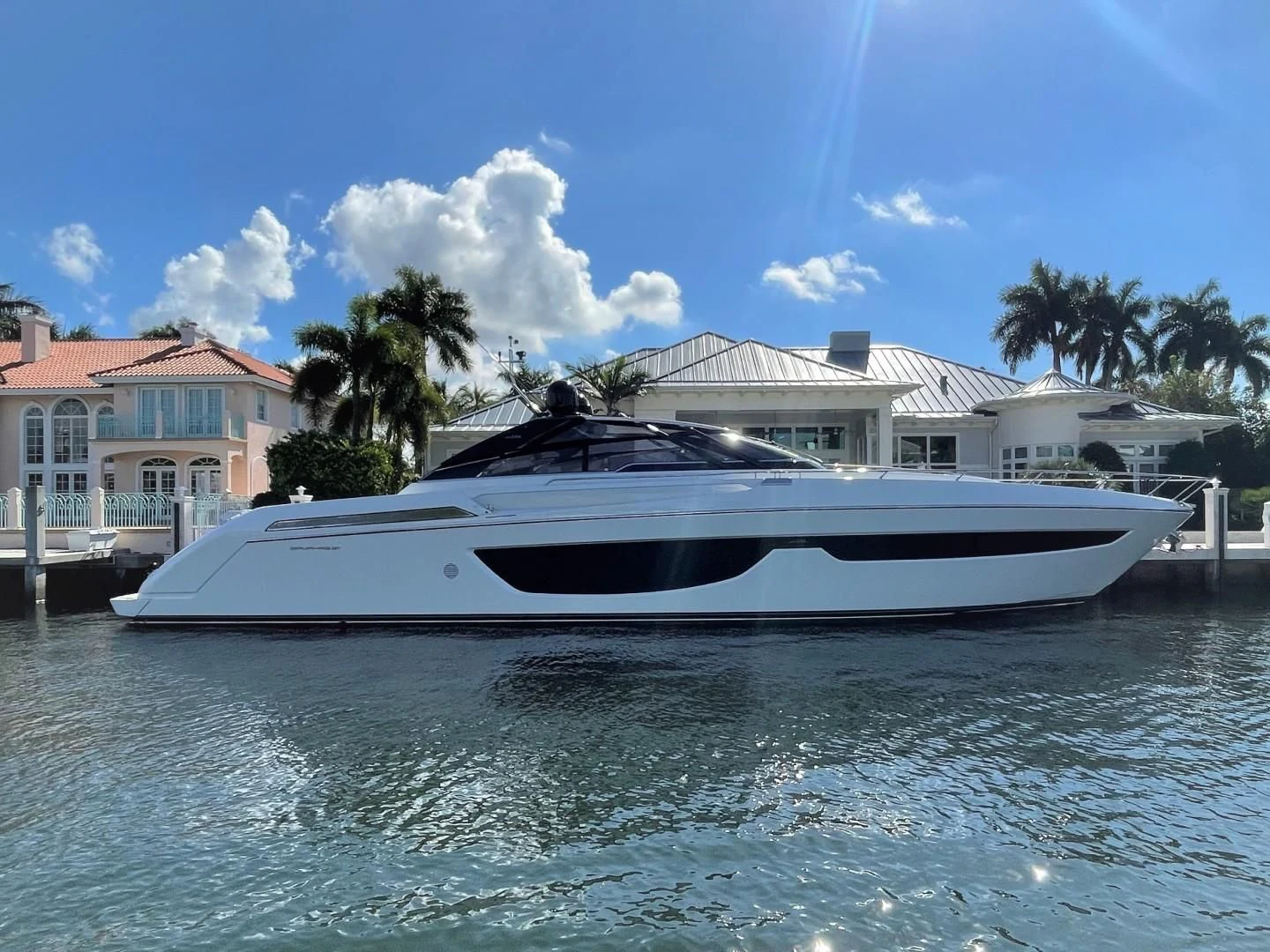 a white boat in the water aboard REGENCY Yacht for Sale