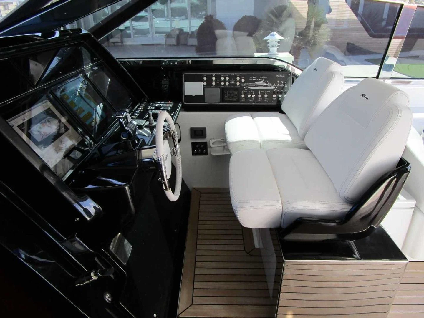 inside of a car aboard REGENCY Yacht for Sale