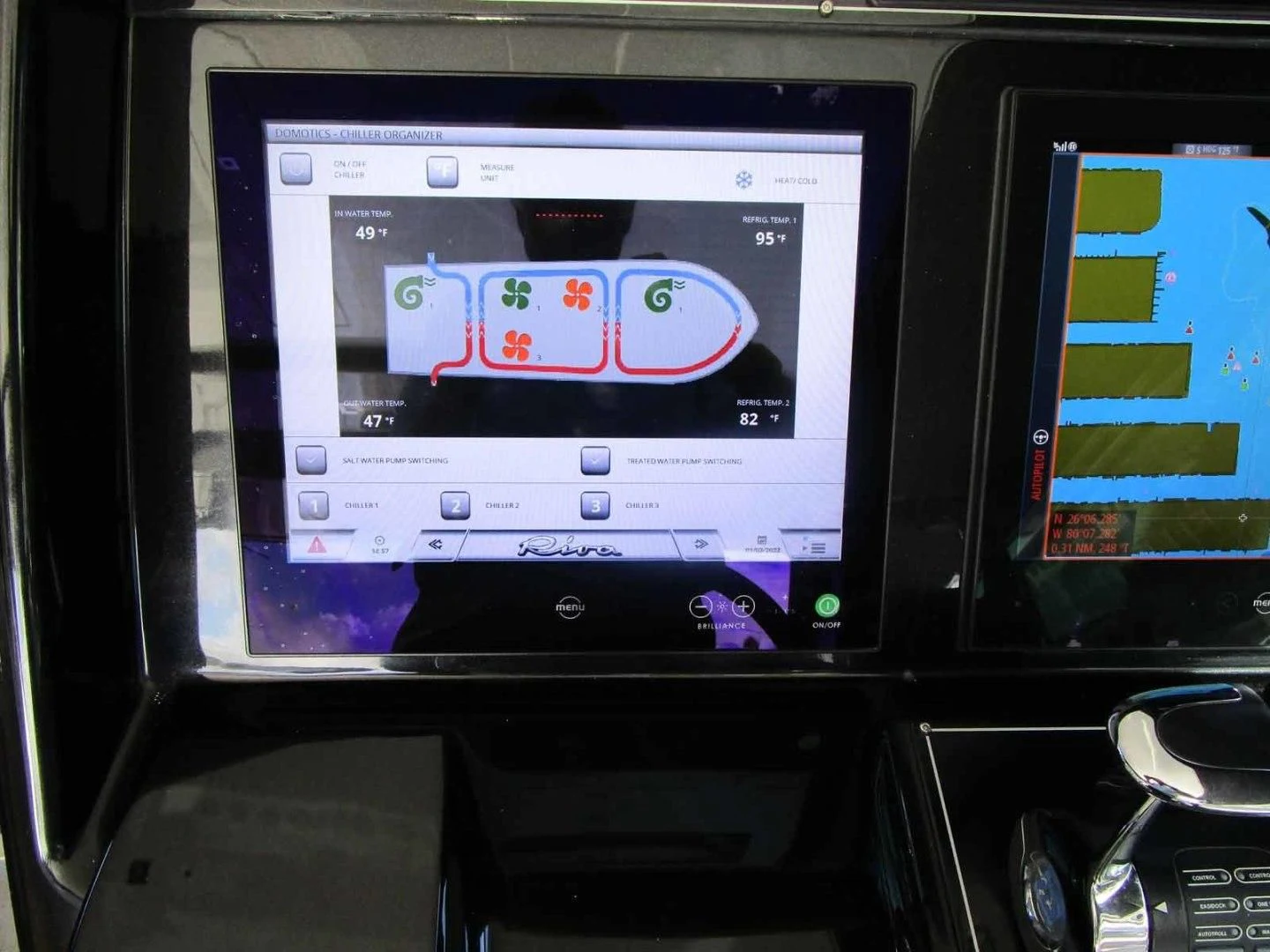 a tablet on a machine aboard REGENCY Yacht for Sale