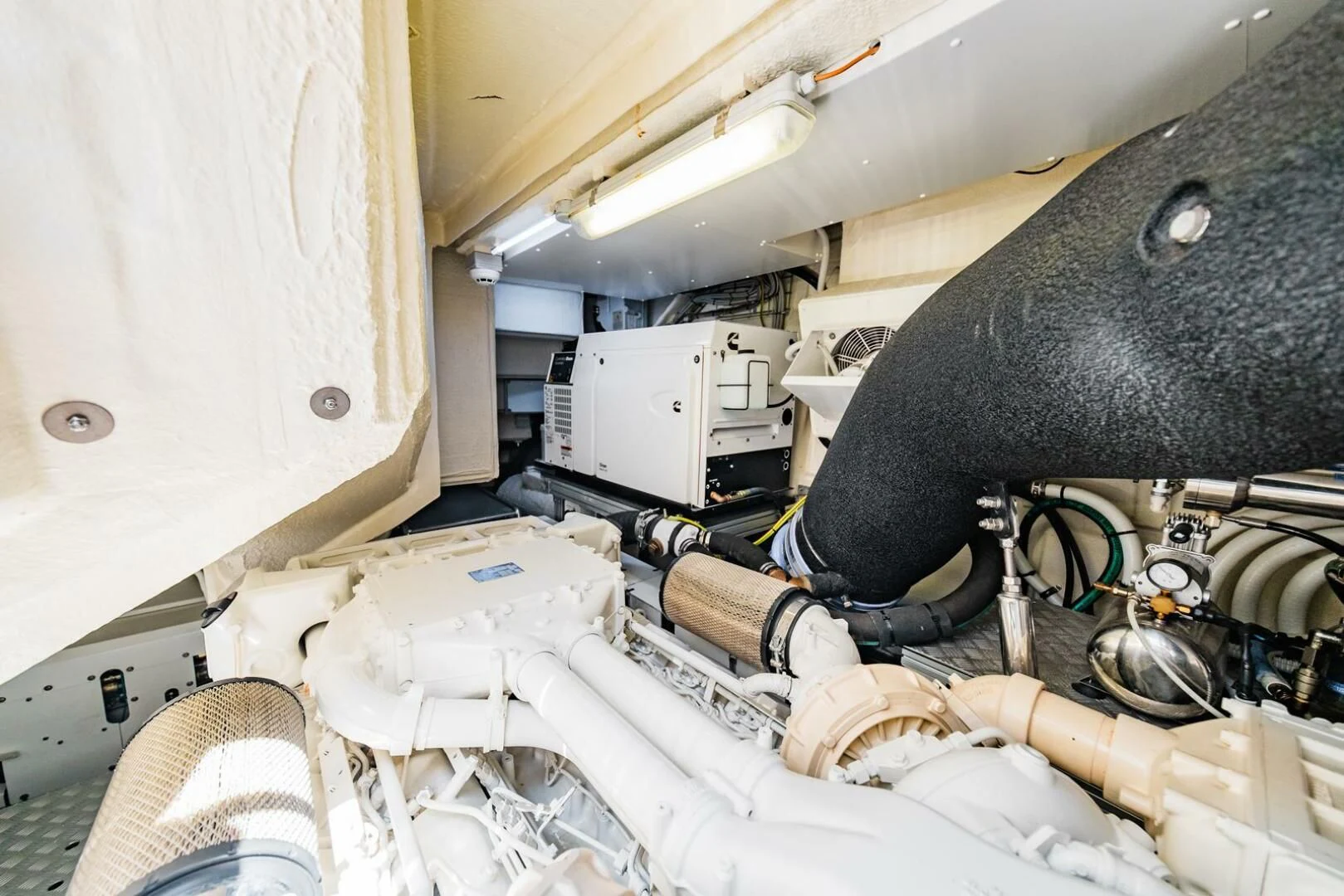 a machine with a large piece of paper in it aboard REGENCY Yacht for Sale
