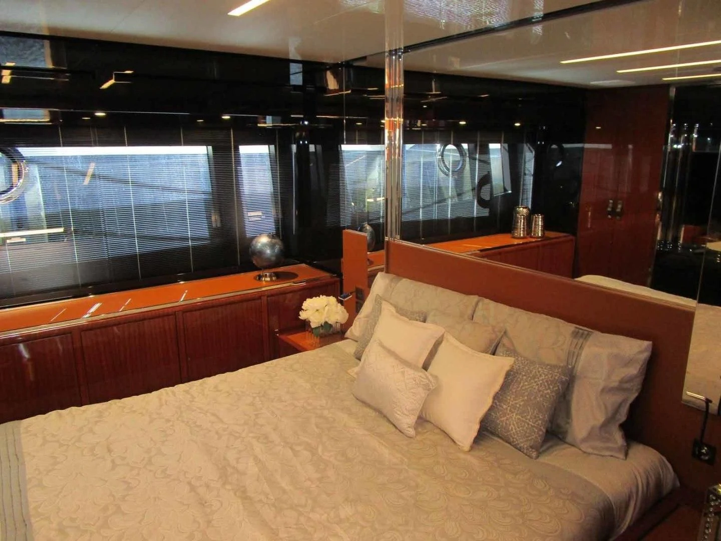 a bed with pillows aboard REGENCY Yacht for Sale
