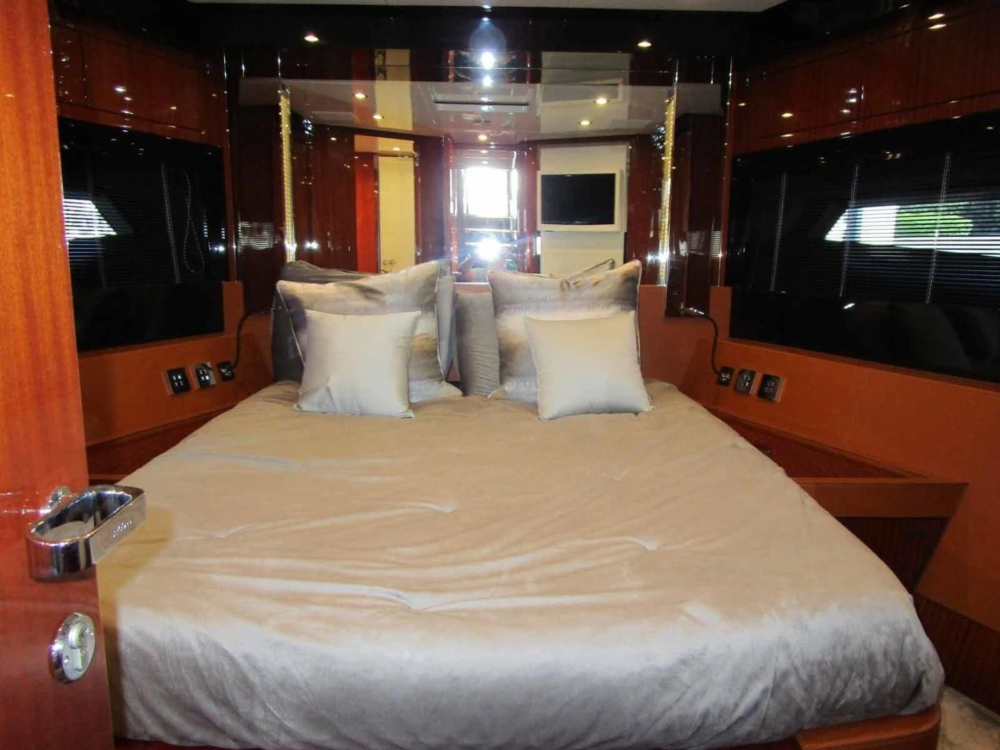 a bed with pillows aboard REGENCY Yacht for Sale
