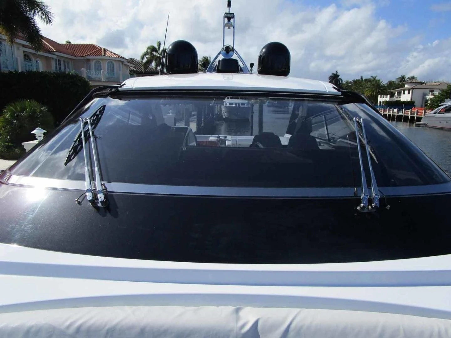 a white car parked in a driveway aboard REGENCY Yacht for Sale