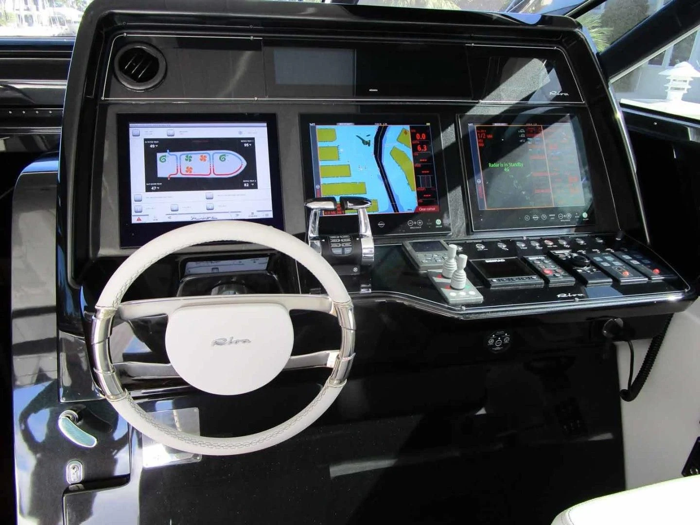 inside of a car aboard REGENCY Yacht for Sale