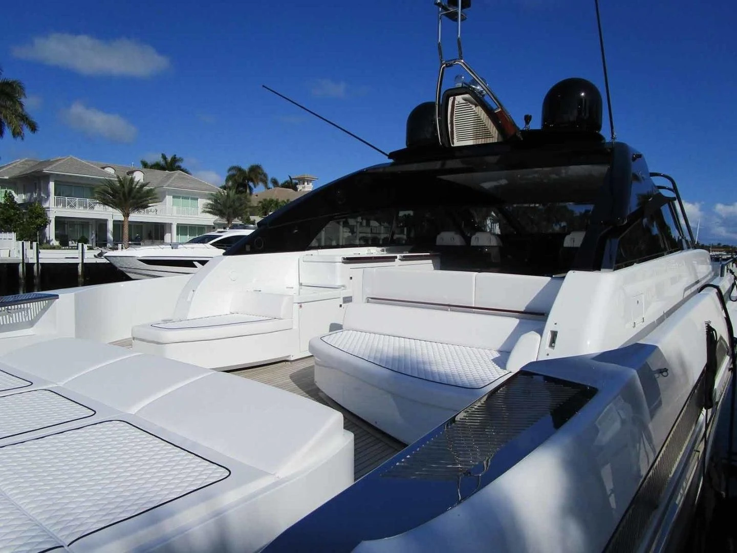 a boat with a black top aboard REGENCY Yacht for Sale