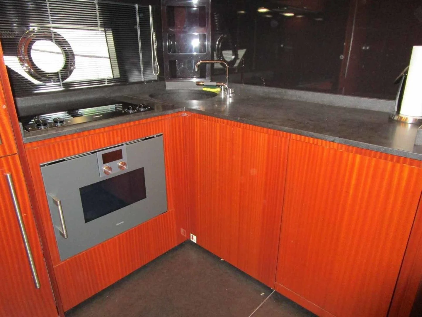 a kitchen with a microwave oven aboard REGENCY Yacht for Sale