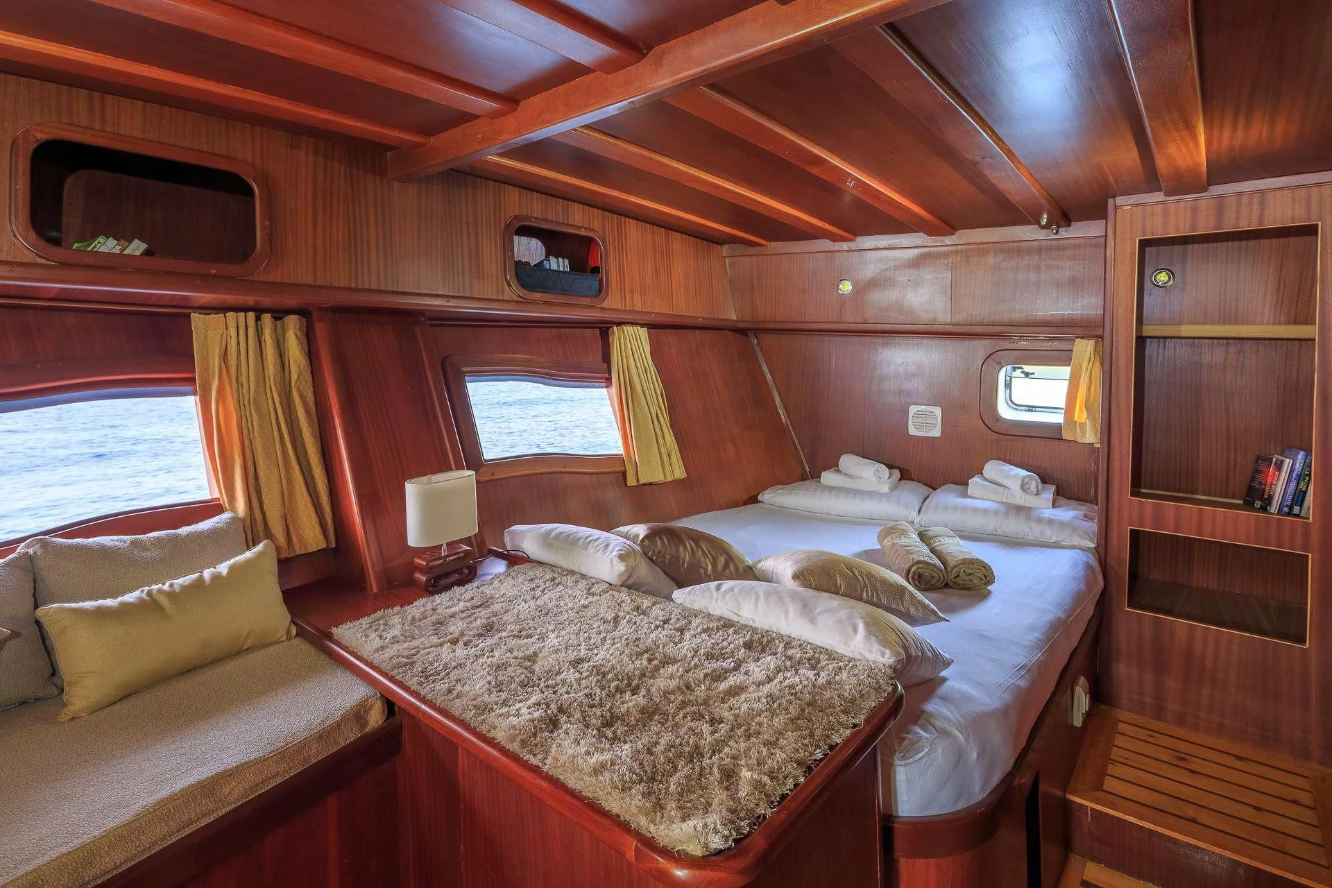 a cabin with a bed aboard ALLURE E Yacht for Sale