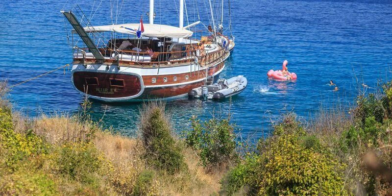 a boat in the water aboard ALLURE E Yacht for Sale