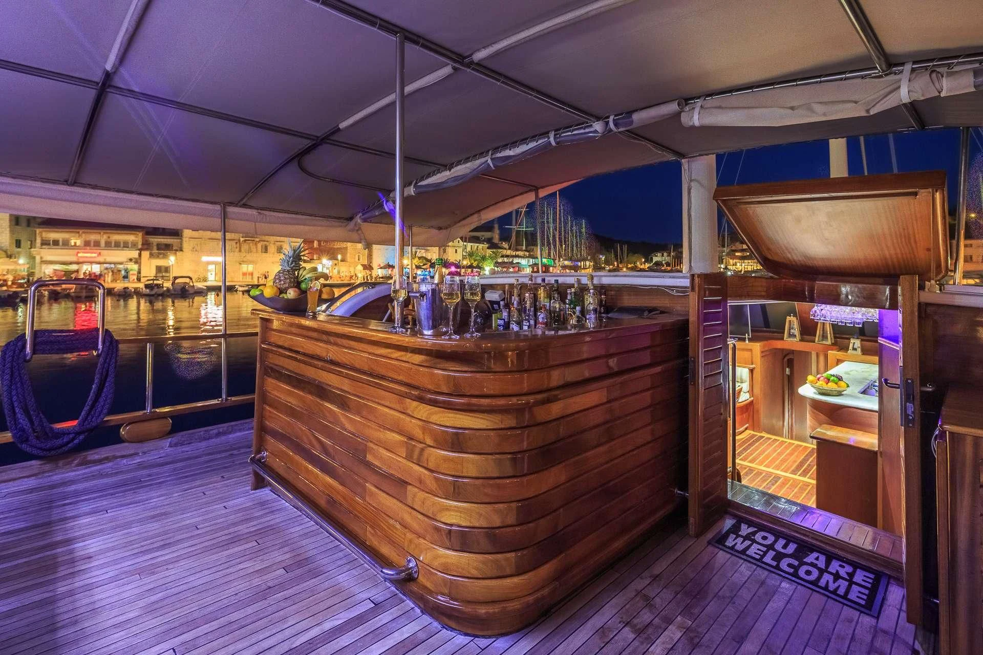 a boat on a dock aboard ALLURE E Yacht for Sale