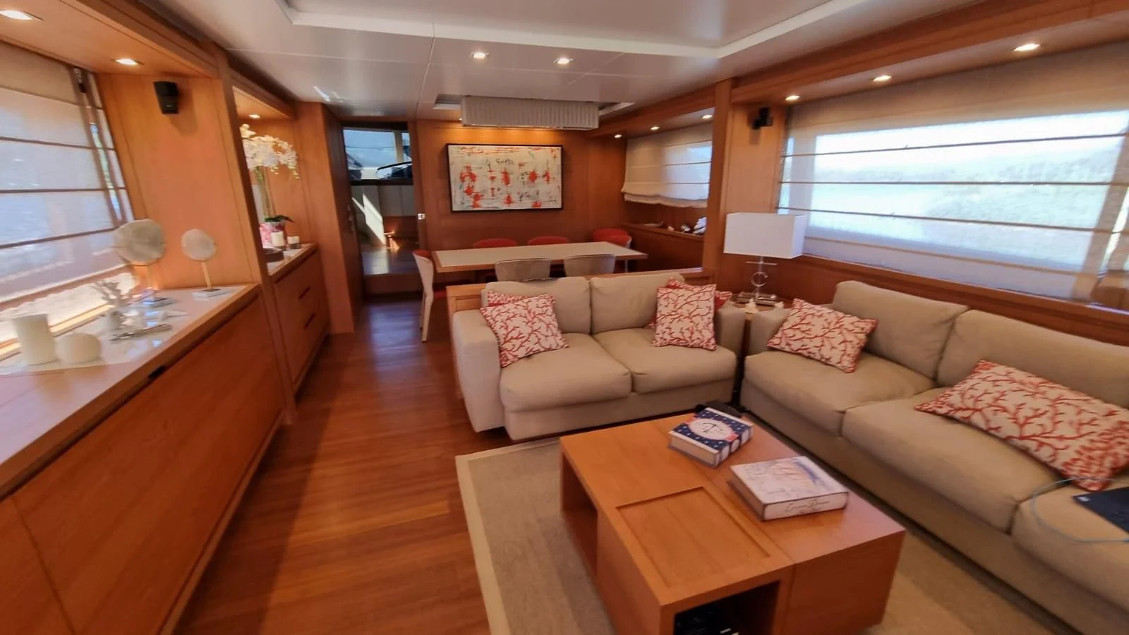 a living room with a couch and a table aboard BRIVIDO Yacht for Sale