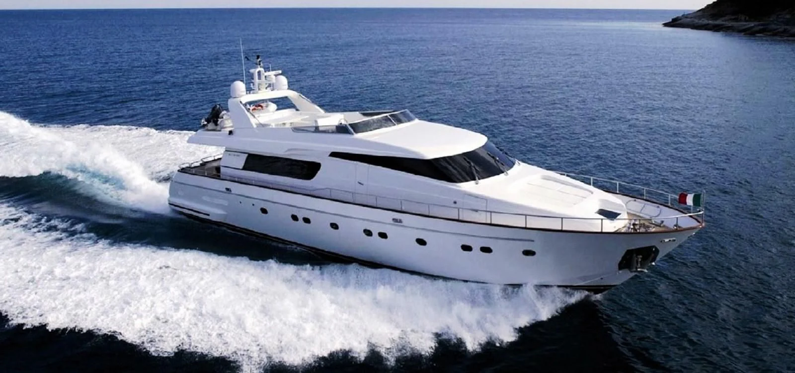 a white yacht on the water aboard BRIVIDO Yacht for Sale