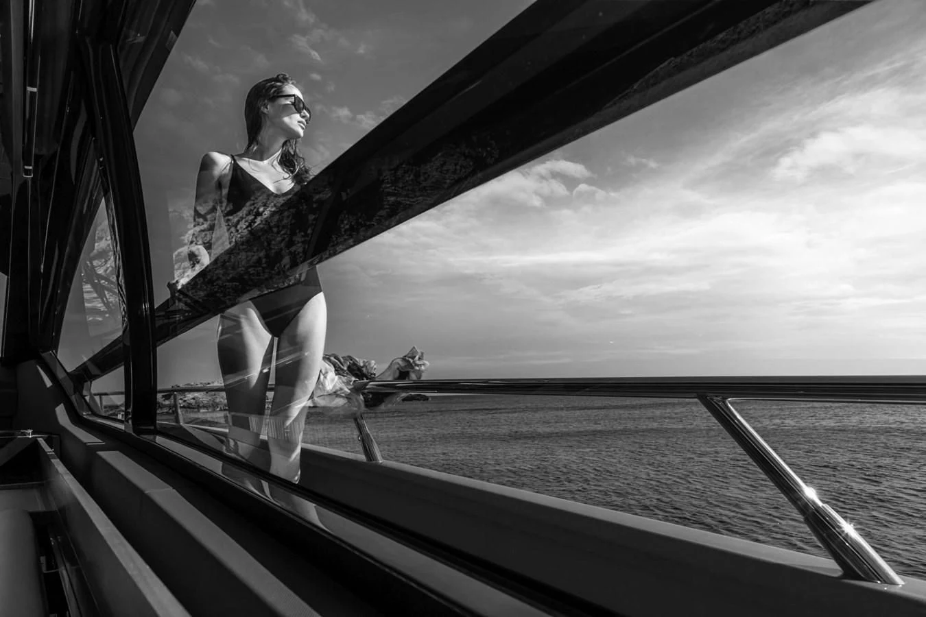 a person sitting on a boat aboard RIVA 66' RIBELLE Yacht for Sale