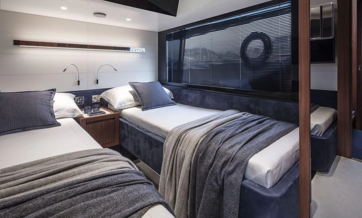 a couple of beds in a room aboard RIVA 66' RIBELLE Yacht for Sale