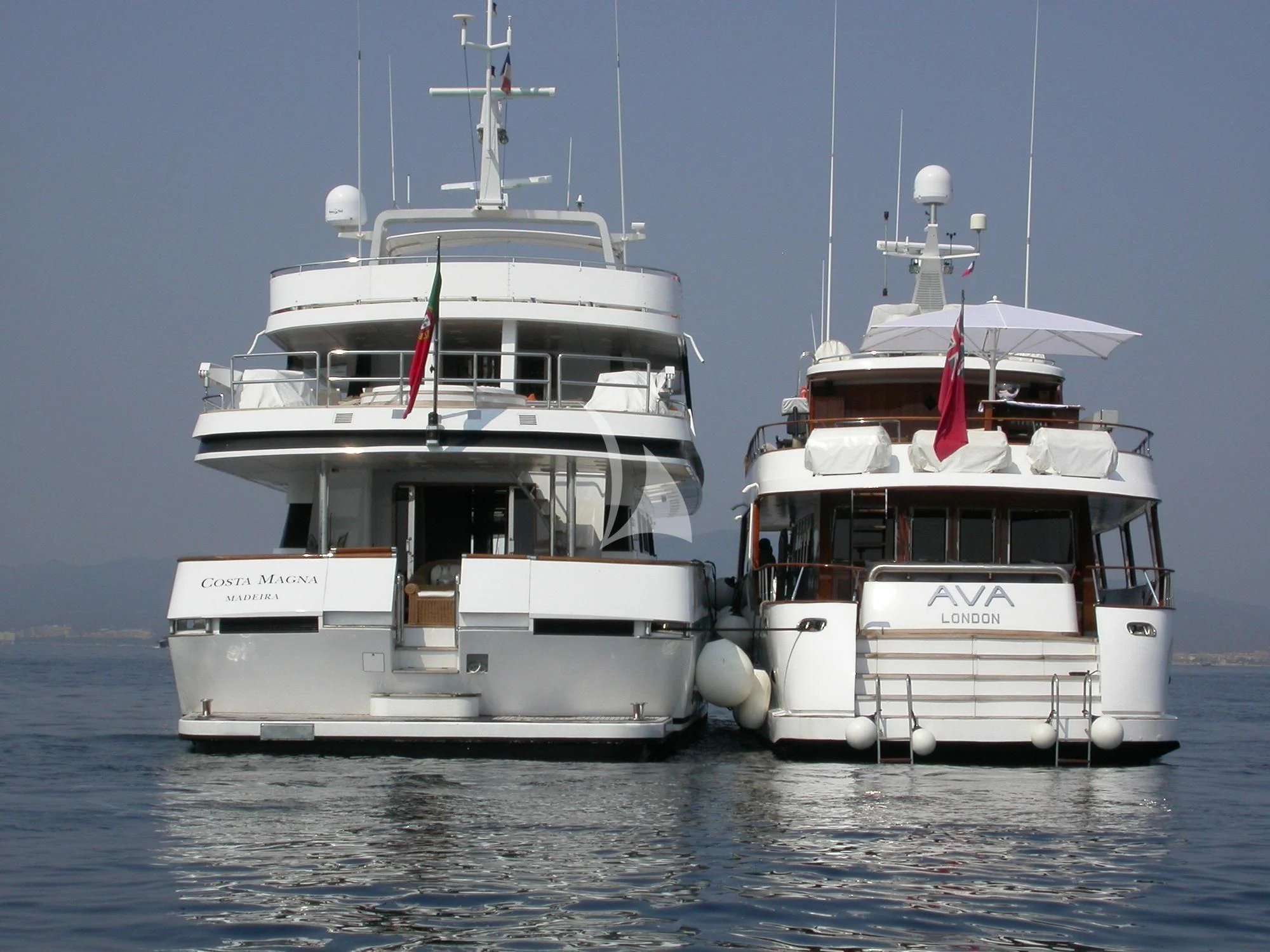 a few white boats in the water aboard COSTA MAGNA Yacht for Sale