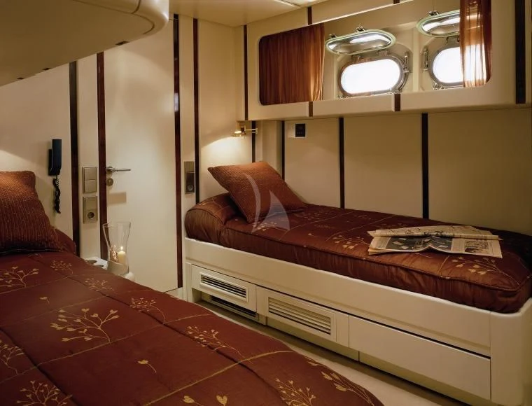 a couple of beds in a hotel room aboard COSTA MAGNA Yacht for Sale