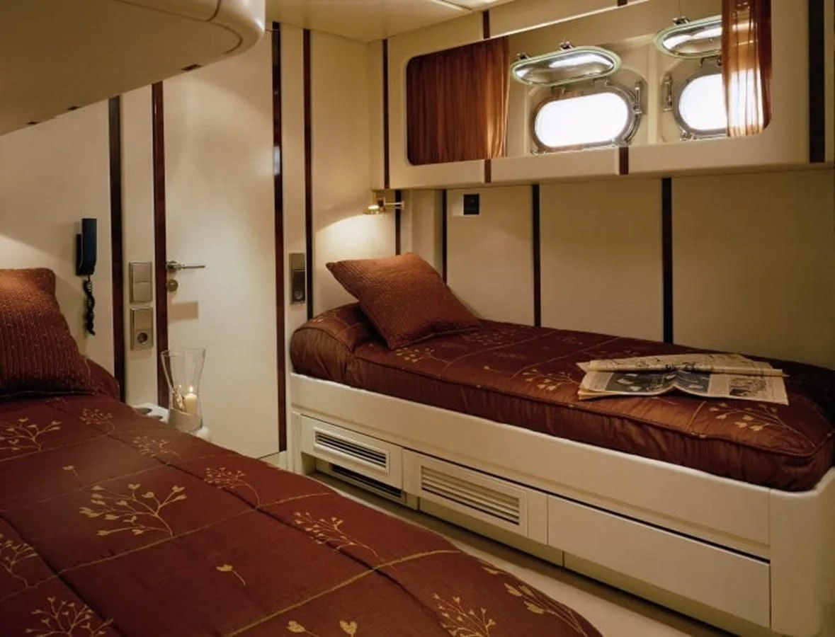 a couple of beds in a hotel room aboard COSTA MAGNA Yacht for Sale