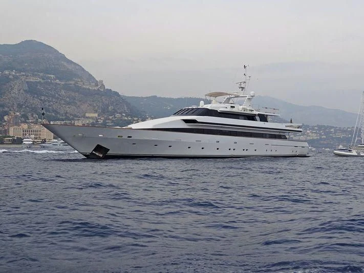 a white yacht in the water aboard COSTA MAGNA Yacht for Sale