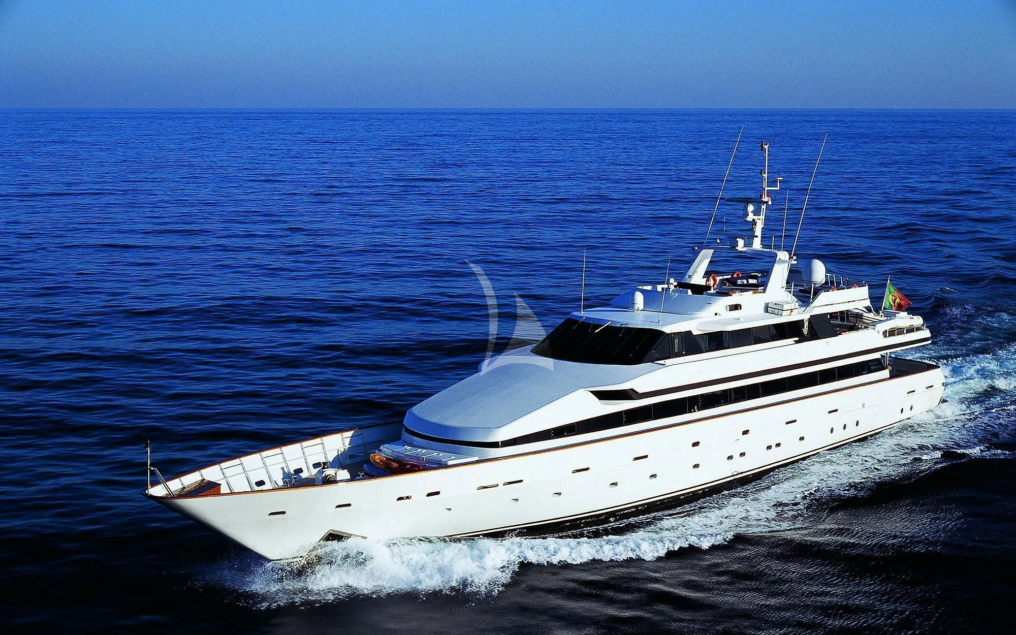 a white boat on the water aboard COSTA MAGNA Yacht for Sale