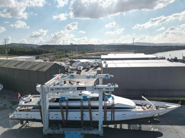 a large white boat sits in a harbor aboard COSTA MAGNA Yacht for Sale
