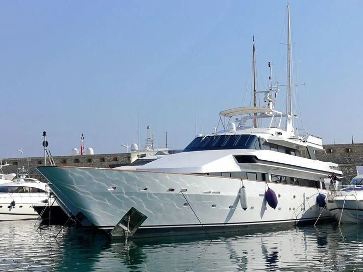 a white yacht docked aboard COSTA MAGNA Yacht for Sale