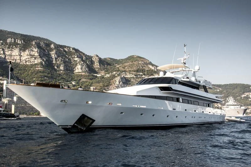 a white yacht on the water aboard COSTA MAGNA Yacht for Sale
