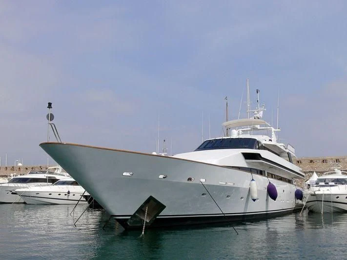 a white yacht in the water aboard COSTA MAGNA Yacht for Sale