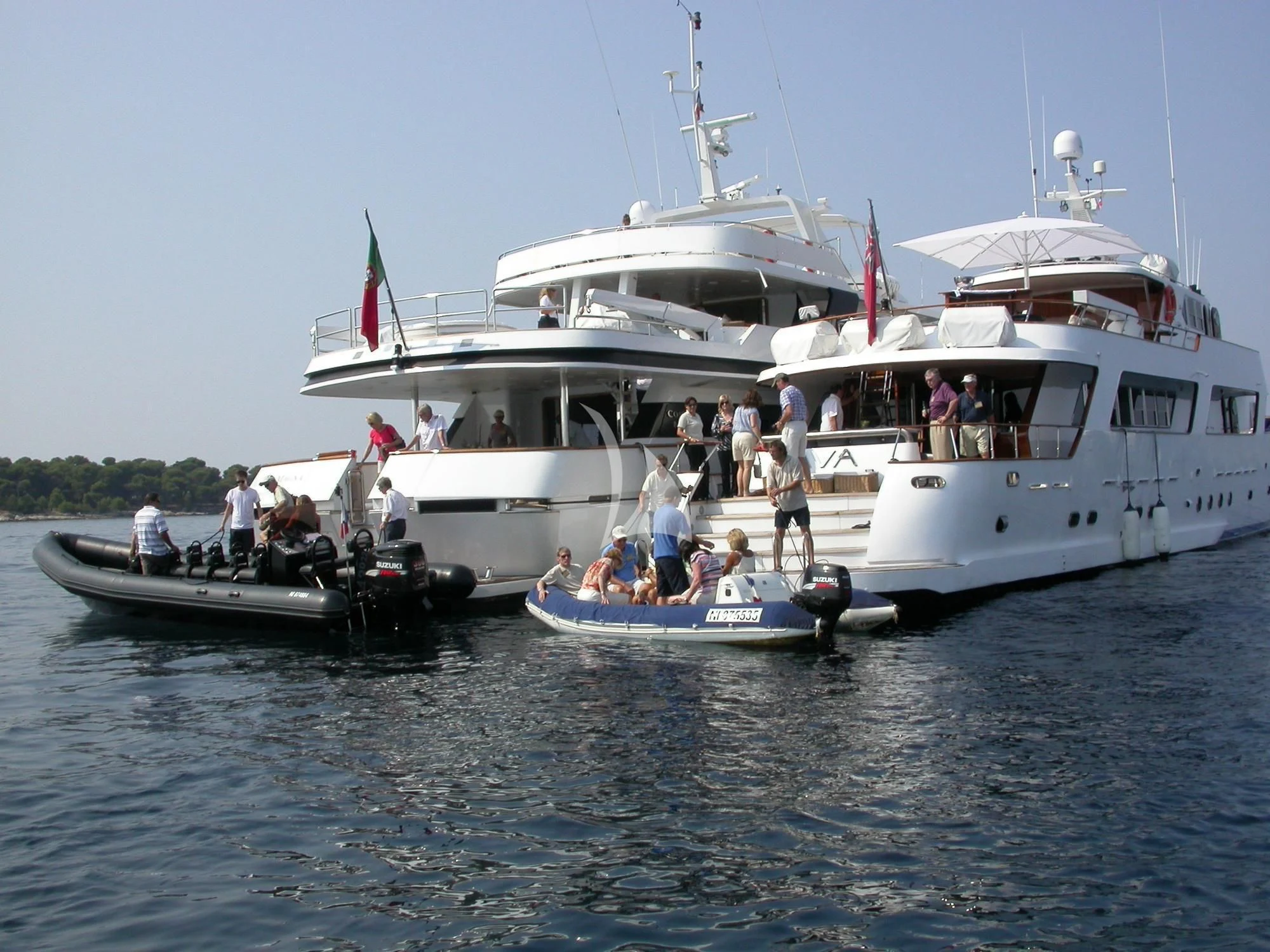 a group of people on a boat aboard COSTA MAGNA Yacht for Sale