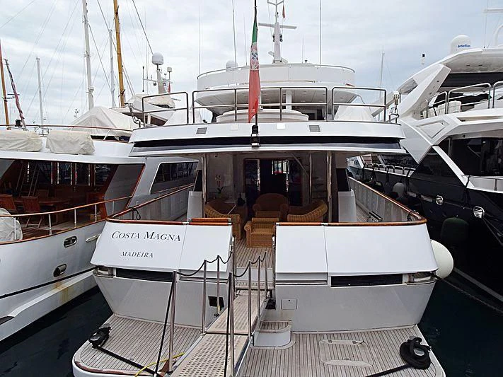 a boat with a deck aboard COSTA MAGNA Yacht for Sale