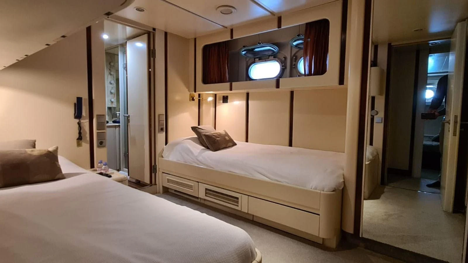 a room with two beds aboard COSTA MAGNA Yacht for Sale