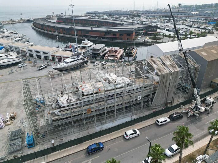 a large parking lot with many boats aboard COSTA MAGNA Yacht for Sale