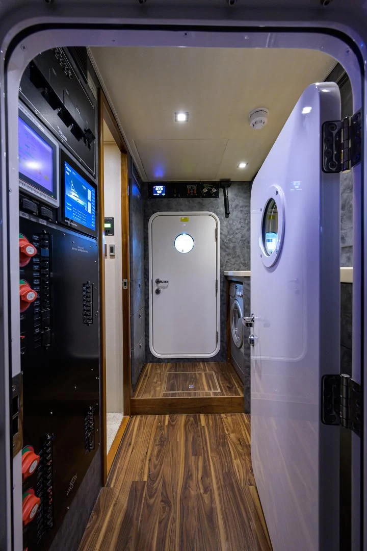 a row of machines in a room aboard PASTIME Yacht for Sale