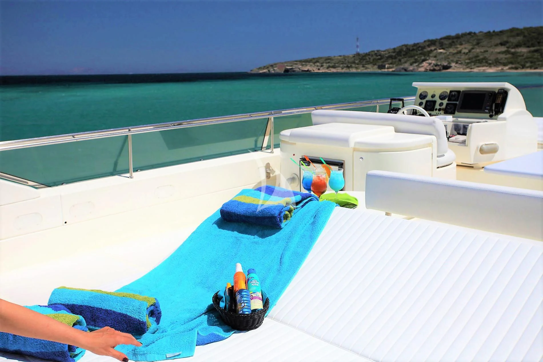 a pool with a table and chairs on it aboard KENTAVROS II Yacht for Charter