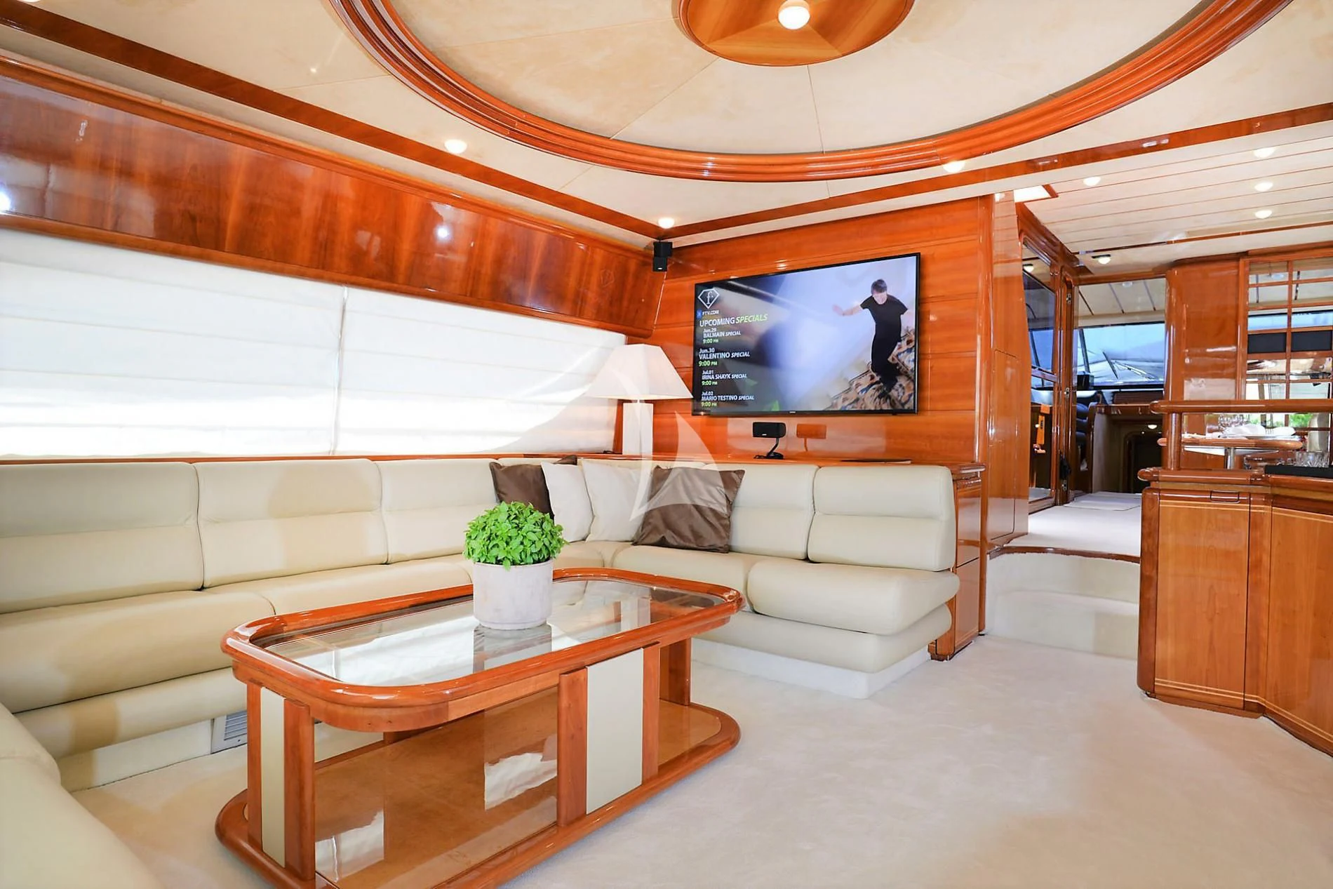 a living room with a couch and a coffee table aboard KENTAVROS II Yacht for Charter