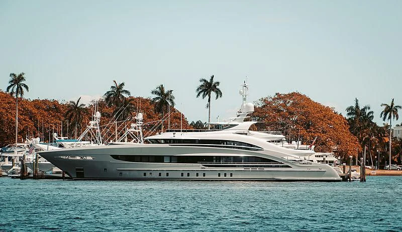 a large white boat in the water aboard OMAHA Yacht for Sale