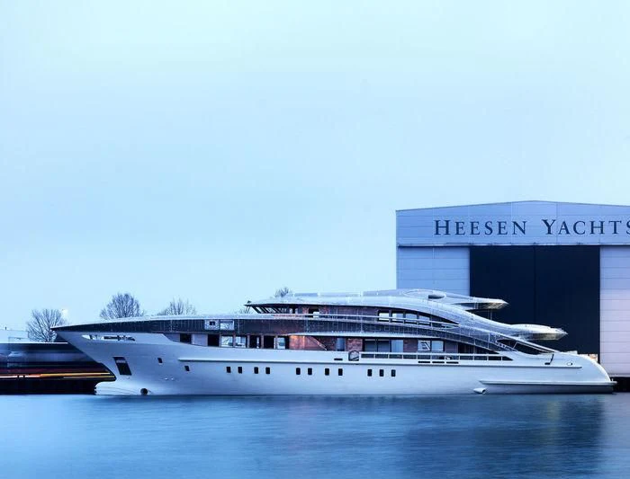 a large white boat in a body of water aboard OMAHA Yacht for Sale