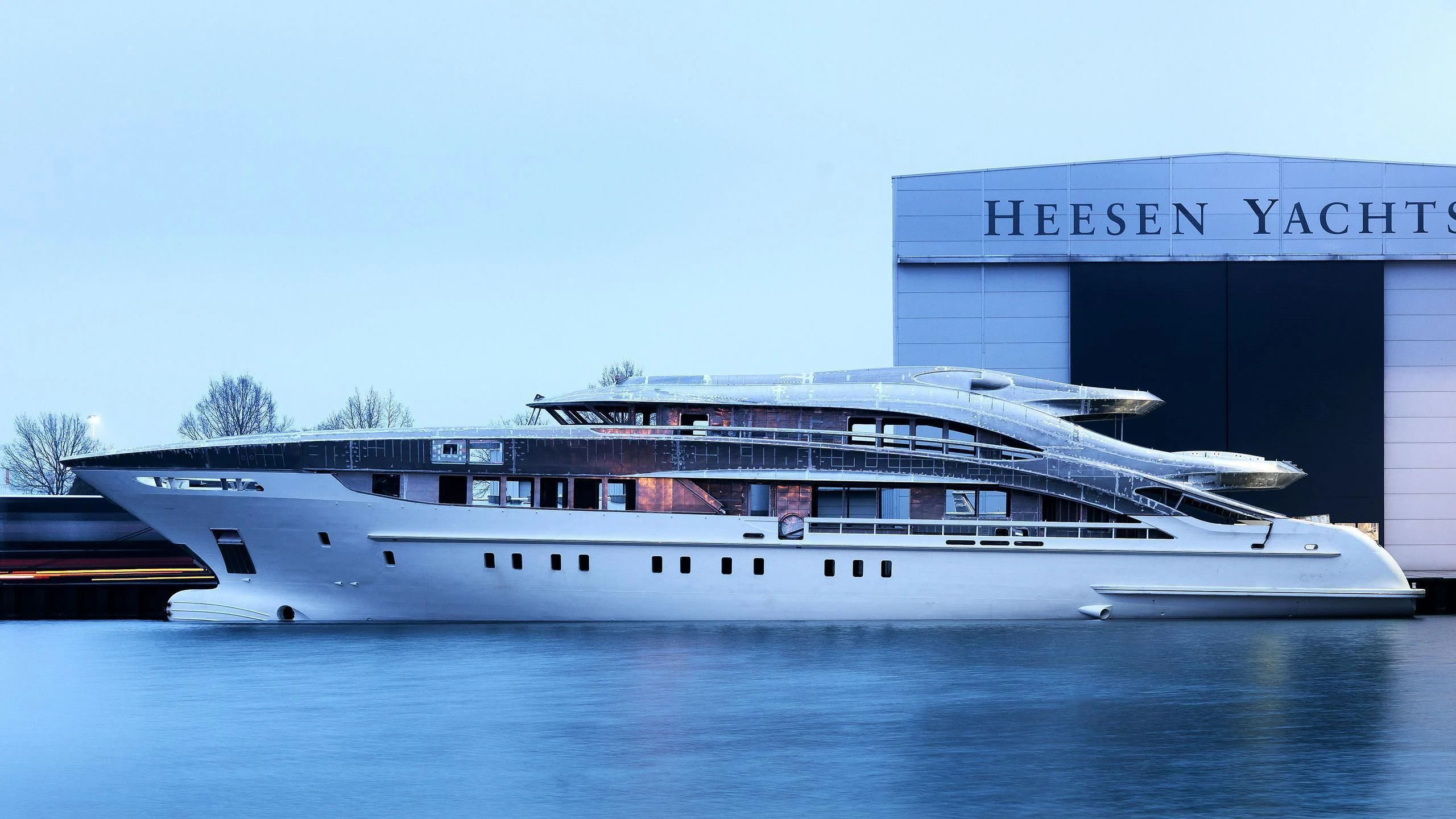 a large white boat in a body of water aboard OMAHA Yacht for Sale