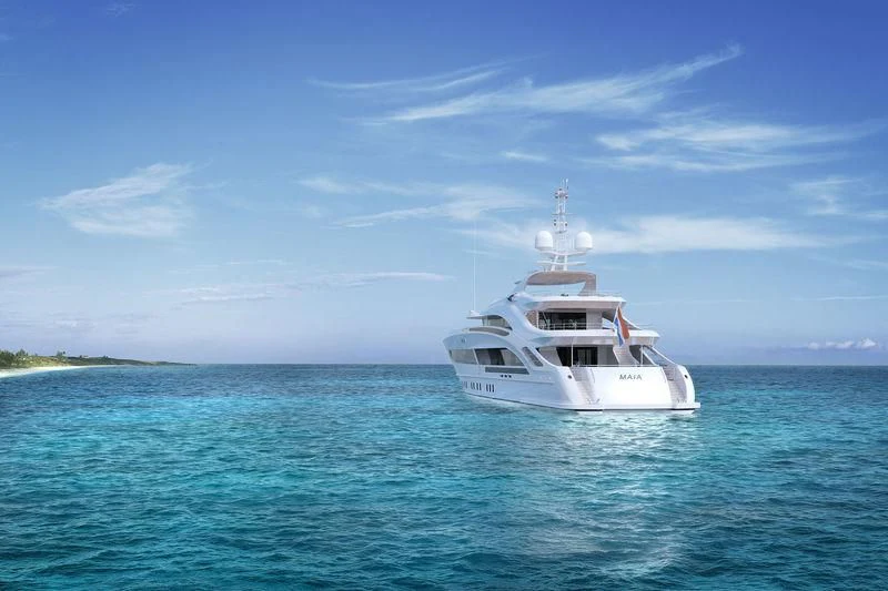 a white boat in the water aboard OMAHA Yacht for Sale