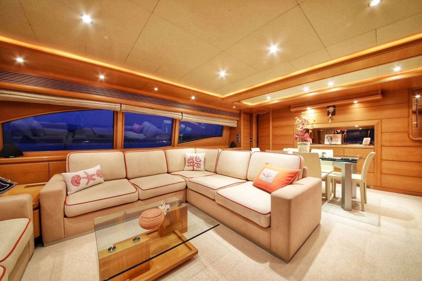 a living room with a couch and a table aboard FUNDA D Yacht for Sale