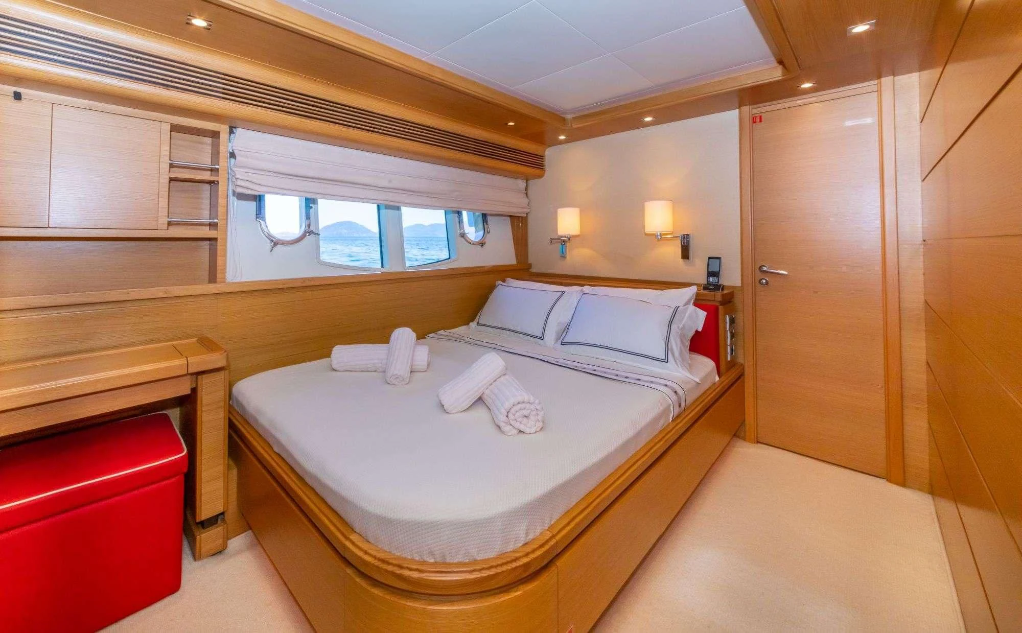 a room with a bed and a window aboard FUNDA D Yacht for Sale