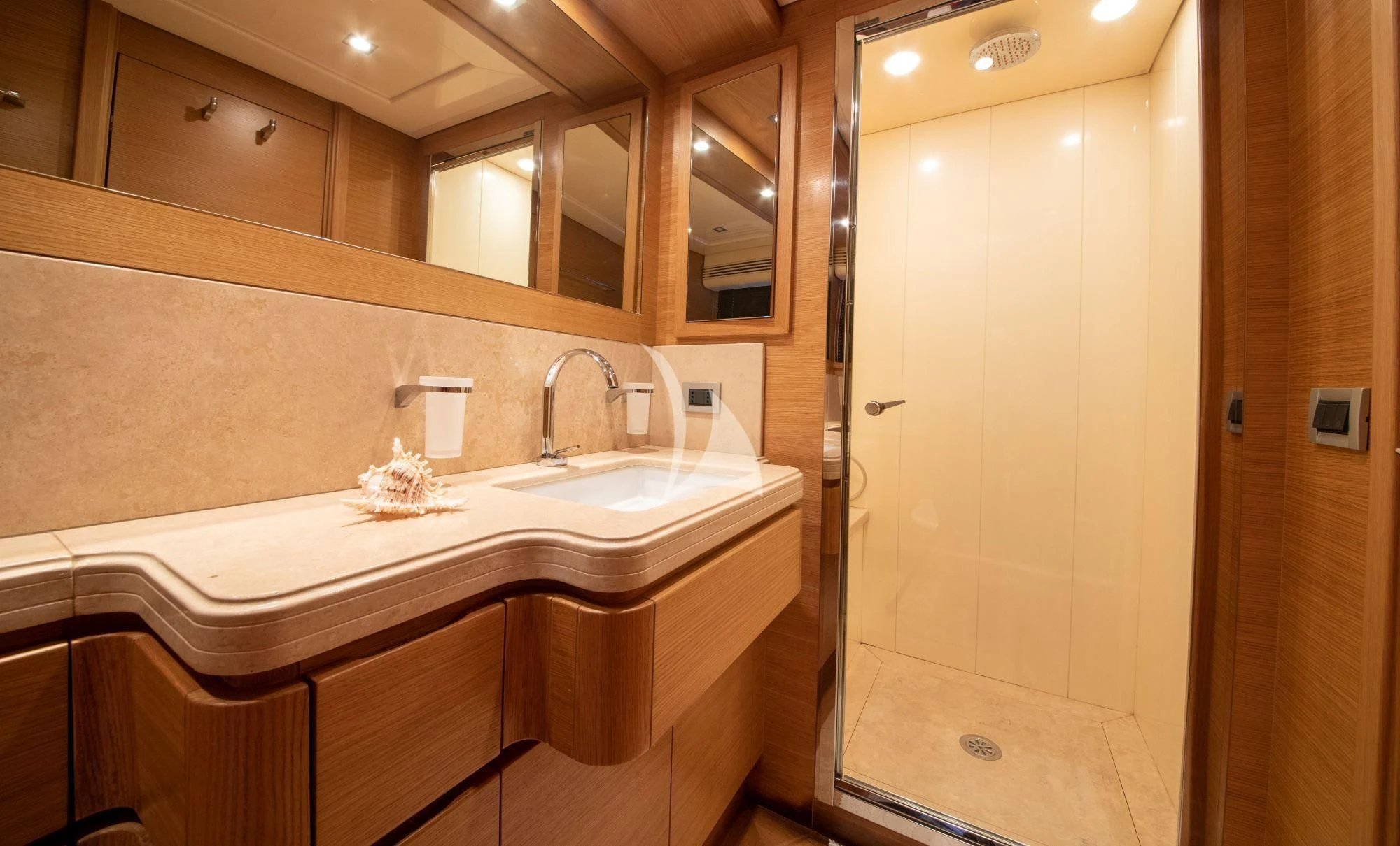 a bathroom with a sink and a mirror aboard FUNDA D Yacht for Sale