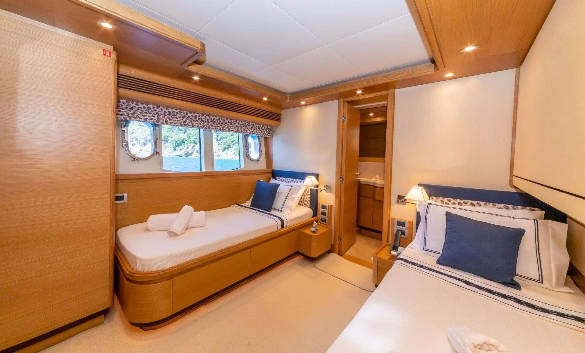 a room with two beds aboard FUNDA D Yacht for Sale