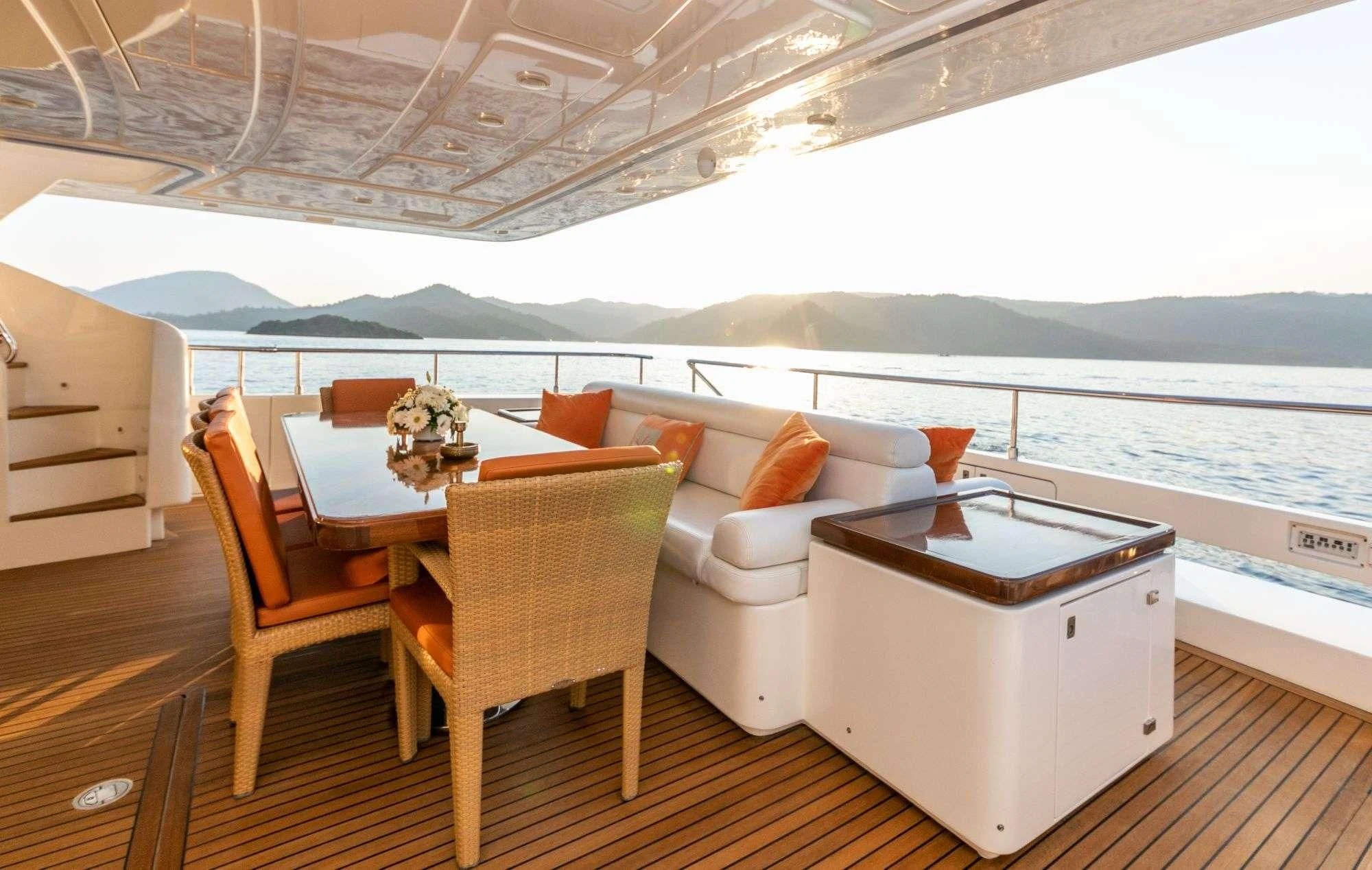 a living room with a table and chairs aboard FUNDA D Yacht for Sale