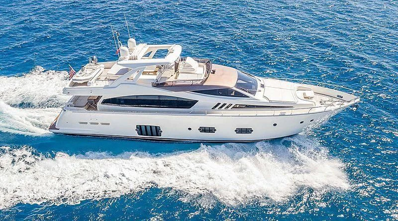 a white yacht on the water aboard LEON Yacht for Sale