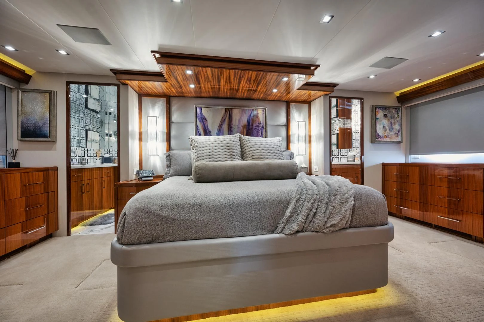 a large living room with a large bed aboard RITZ SEA Yacht for Sale