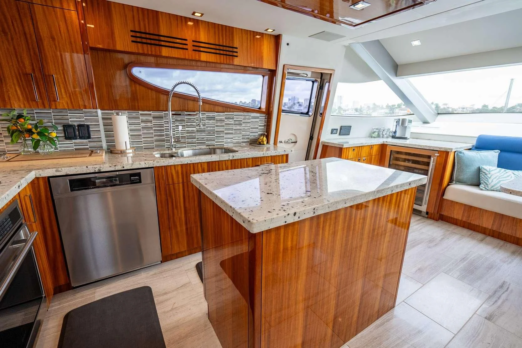a kitchen with wooden cabinets aboard RITZ SEA Yacht for Sale