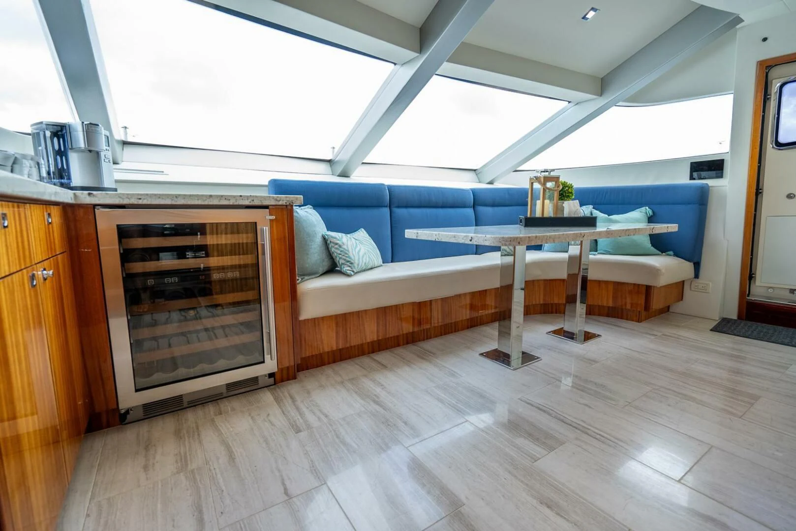 a kitchen with a fireplace aboard RITZ SEA Yacht for Sale