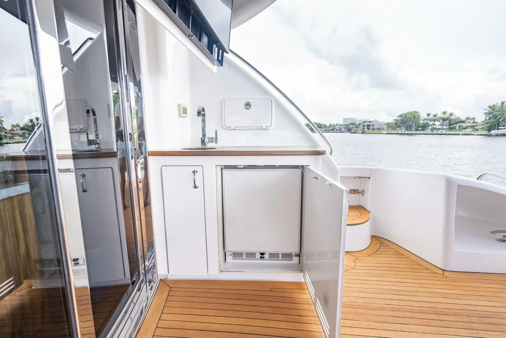 a kitchen with a sink and a microwave aboard RITZ SEA Yacht for Sale